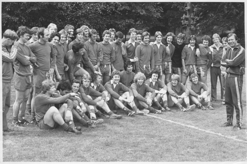New Aberdeen manager Alex Ferguson with his players during a training break at Seaton Park in July 1978.