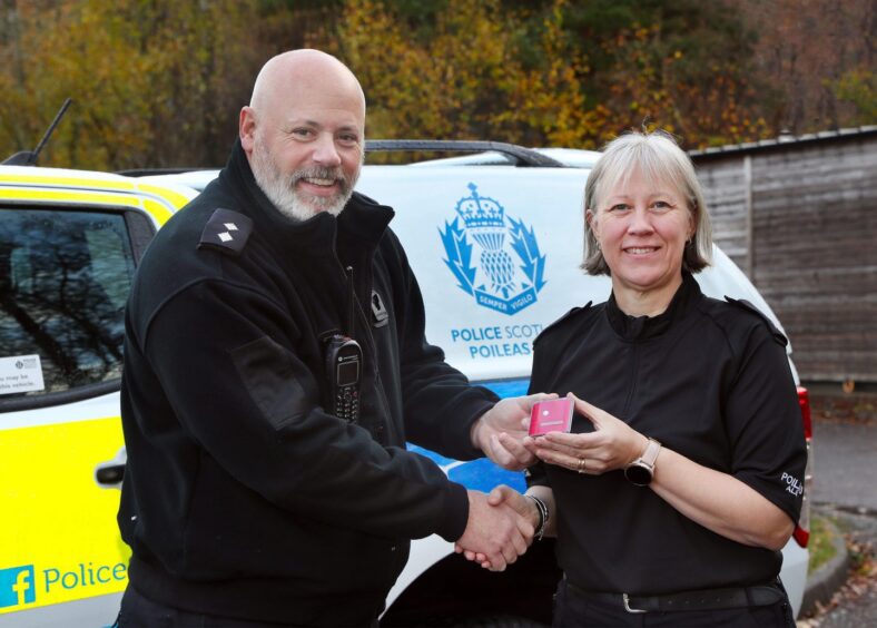 Special constable Alison MacLennan presented with her long service award.