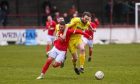 Buckie Thistle's Hamish Munro, right, holds off Jamie Richardson of Brechin City. Pictures by Darrell Benns/DCT Media.