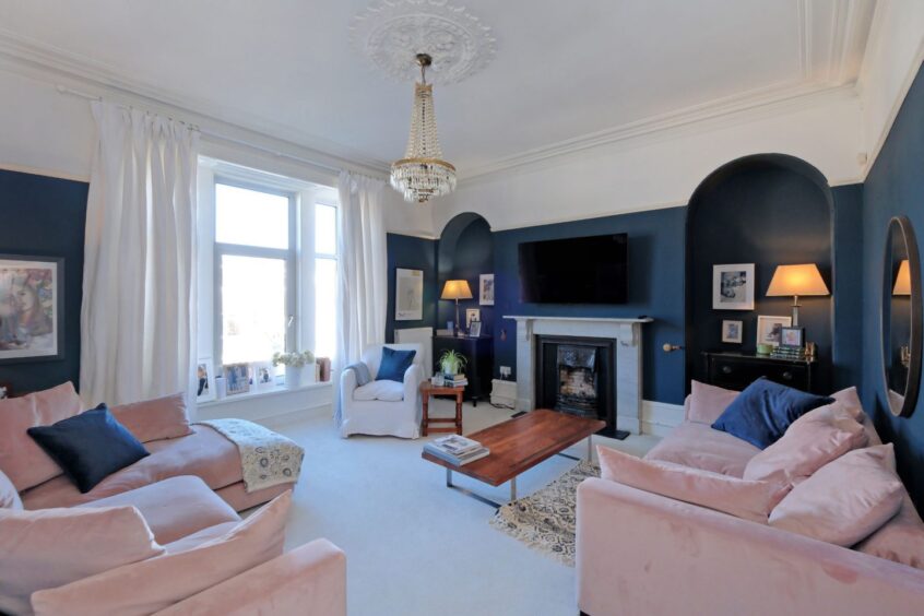 Living room of the house for sale near Duthie Park, featuring high ceiling, cornicing and alcoves.