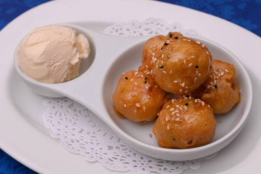 The banana fritters with ice cream. 