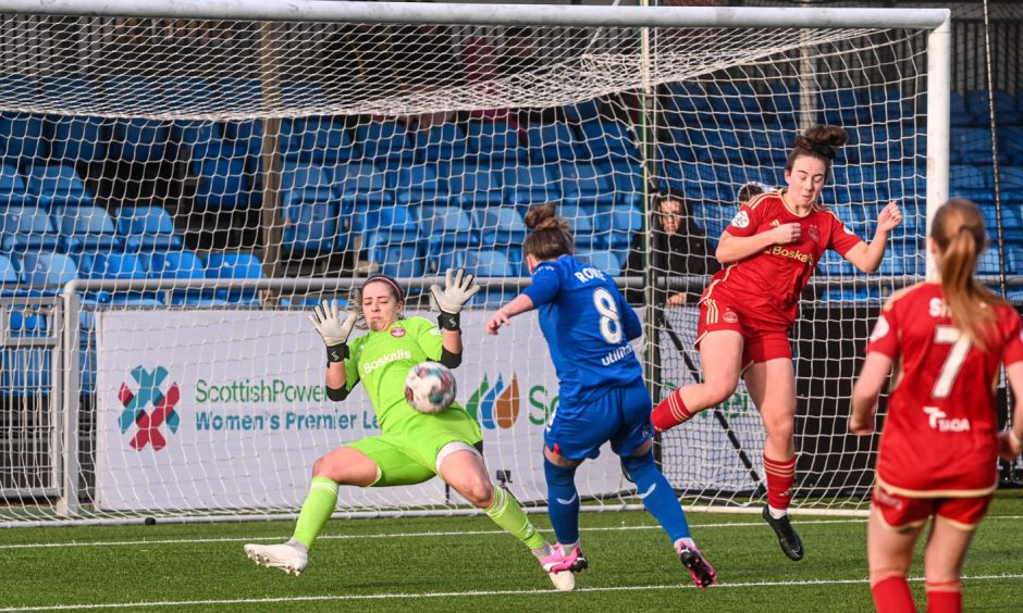 Aberdeen Women goalkeeper Jeni Currie makes a save in the SWPL match against Rangers. 
