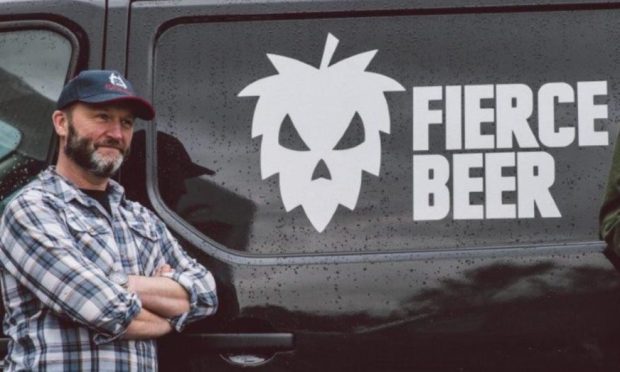 Dave Grant next to a Fierce Beer van.