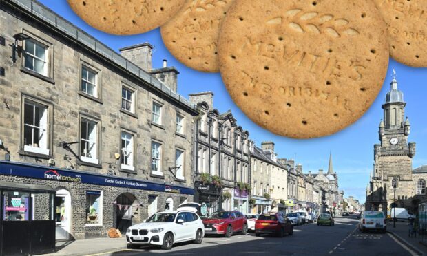 Forres High Street with digestive biscuits in the sky.