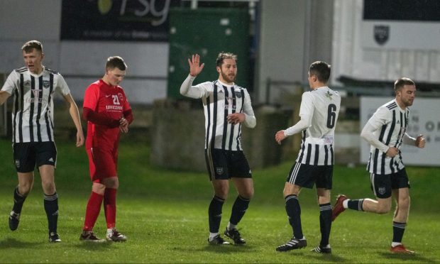 Fraserburgh's Bryan Hay, centre, celebrates scoring against Hermes with team-mate Paul Young (number six). Pictures by Jasperimage.