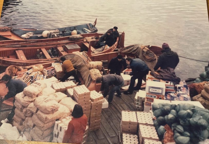 A Klondyker crew loading supplies in Ullapool