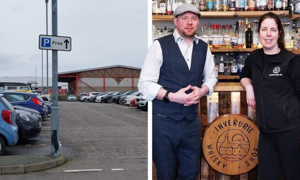 Mike Stuart and Annette Leonard of Inverurie Whisky Shop say removing the free parking on Burn Lane would hit the town's small businesses. Image: Clarke Cooper/DC Thomson