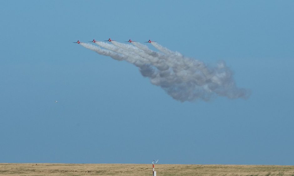Royal Air Force's famous Red arrows in Lossiemouth this morning.