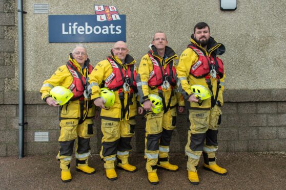 Three generations of Sutherlands - Victor Snr and Jr, David and Declan - at the RNLI in Fraserburgh. Pic: Jason Hedges.