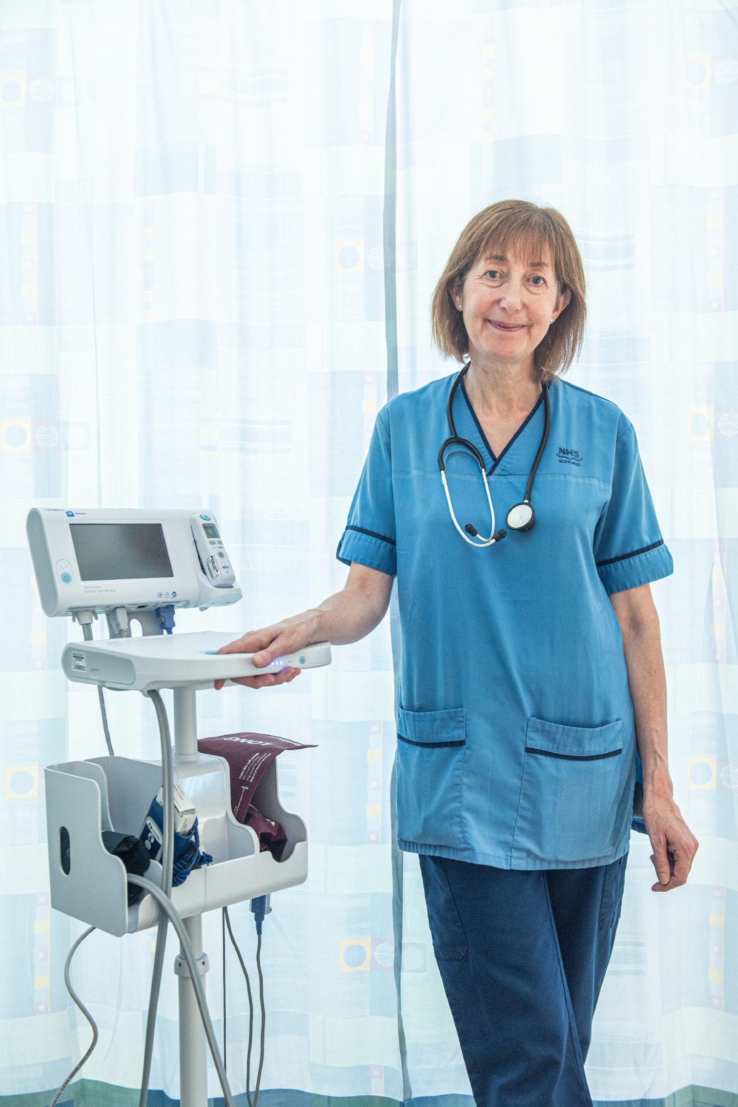 Nairn midwife Maggie Macleod stands next to maternity unit machine in Dr Gray's in Elgin.