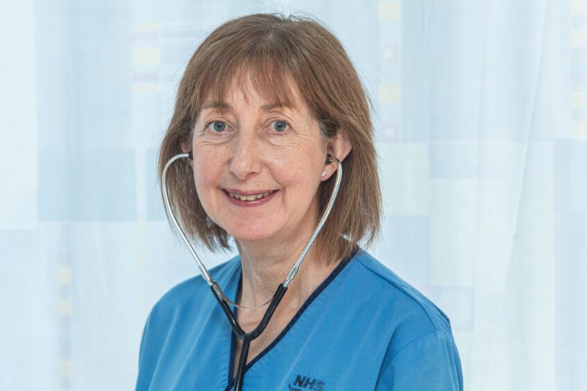 Nairn midwife Maggie Macleod wears a stethoscope in Dr Gray's in Elgin