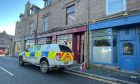 John Ross Chemist, on Ellon's Station Road, has been cordoned off. Image: Shanay Taylor