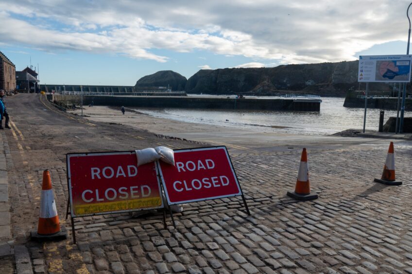 Road closed sign at harbour 