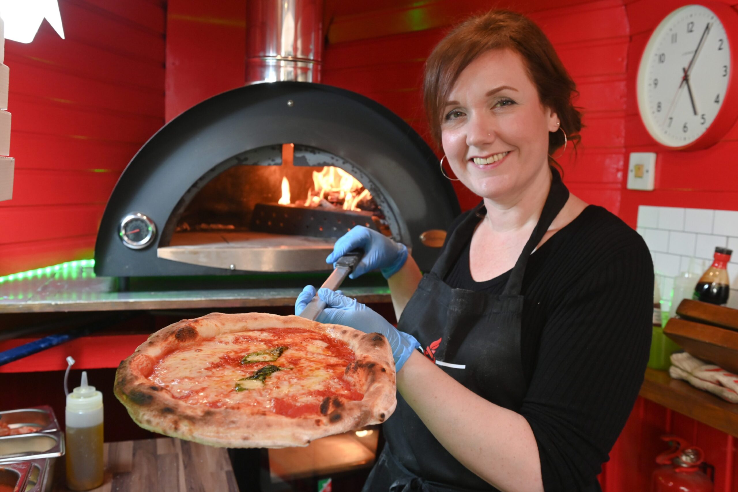 Milltimber mum Ruth Thomas, showing off one of her pizzas.