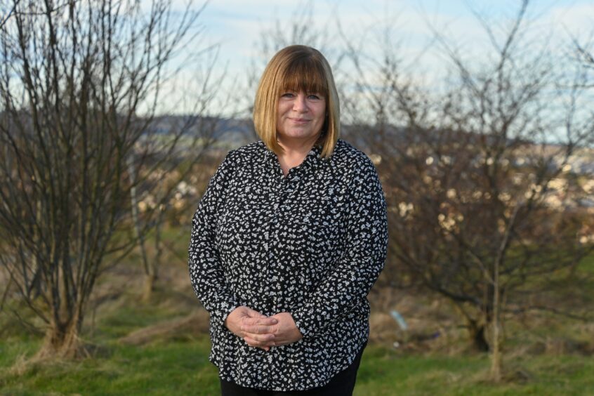 Jenny Gillon smiling into the camera outside Get Active @ Northfield. 