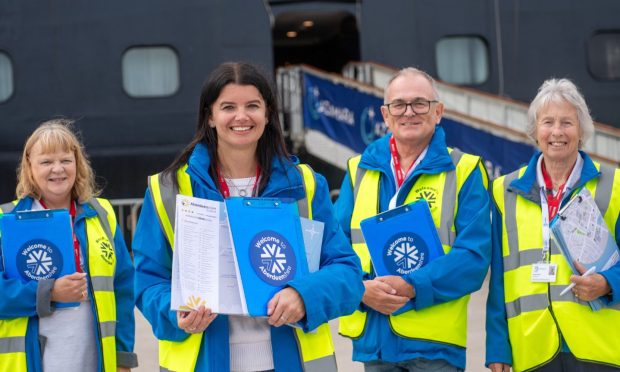 Yvonne Cook, Kelly Wilson, John Robertson and Janet House all set for volunteering duties as Azamara Pursuit visited in July last year. Image: Kath Flannery/DC Thomson