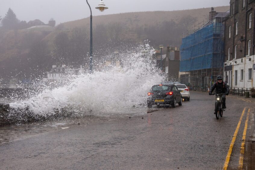 Cars were drenched in the waves on Stonehaven seafront.