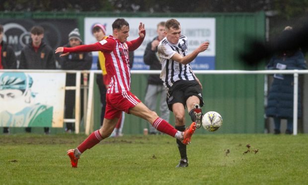 Formartine United's Aaron Norris, left, challenges Kieran Simpson of Fraserburgh. Pictures by Kath Flannery/DCT Media.