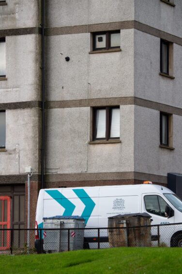 Council staff out at Torry homes in October as the search for Raac in more than 300 local authority homes began. Image: Kami Thomson/DC Thomson