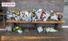 Floral tributes left in memory of Elgin bus driver Keith Rollinson. Image: Jasperimage