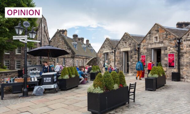 Signs for the Redcoat Café at Edinburgh Castle can be seen in this photo from 2014. Image: Ivica Drusany/Shutterstock