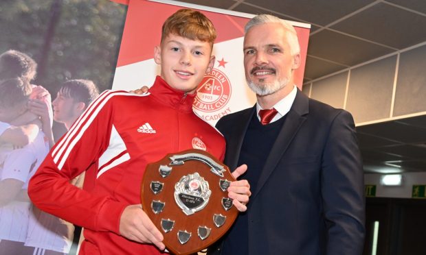 Lewis Carrol pictured with then Aberdeen manager Jim Goodwin after winning the U15 Neale Cooper Award at the Aberdeen FC Youth Academy awards in 2002. Image: Paul Glendell/ DC Thomson