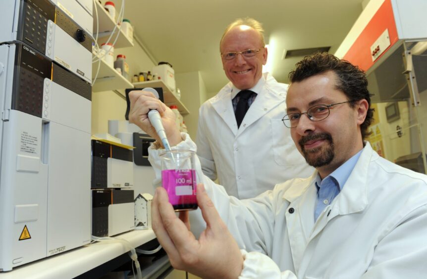 Charlie in 2012 with Professor Matteo Zanda, chair in Medical Technologies and manager of the J. Mallard Scottish Positron Emission Tomography Centre at University of Aberdeen.