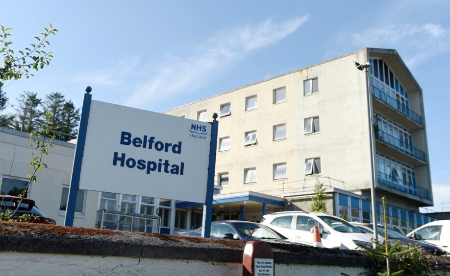 Belford Hospital sign with building in the background