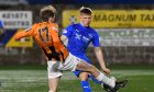 On-loan Dundee United defender Flynn Duffy in action for Peterhead in League Two.