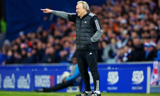 Aberdeen manager Neil Warnock during the 2-1 loss to Rangers at Ibrox. Image: PA