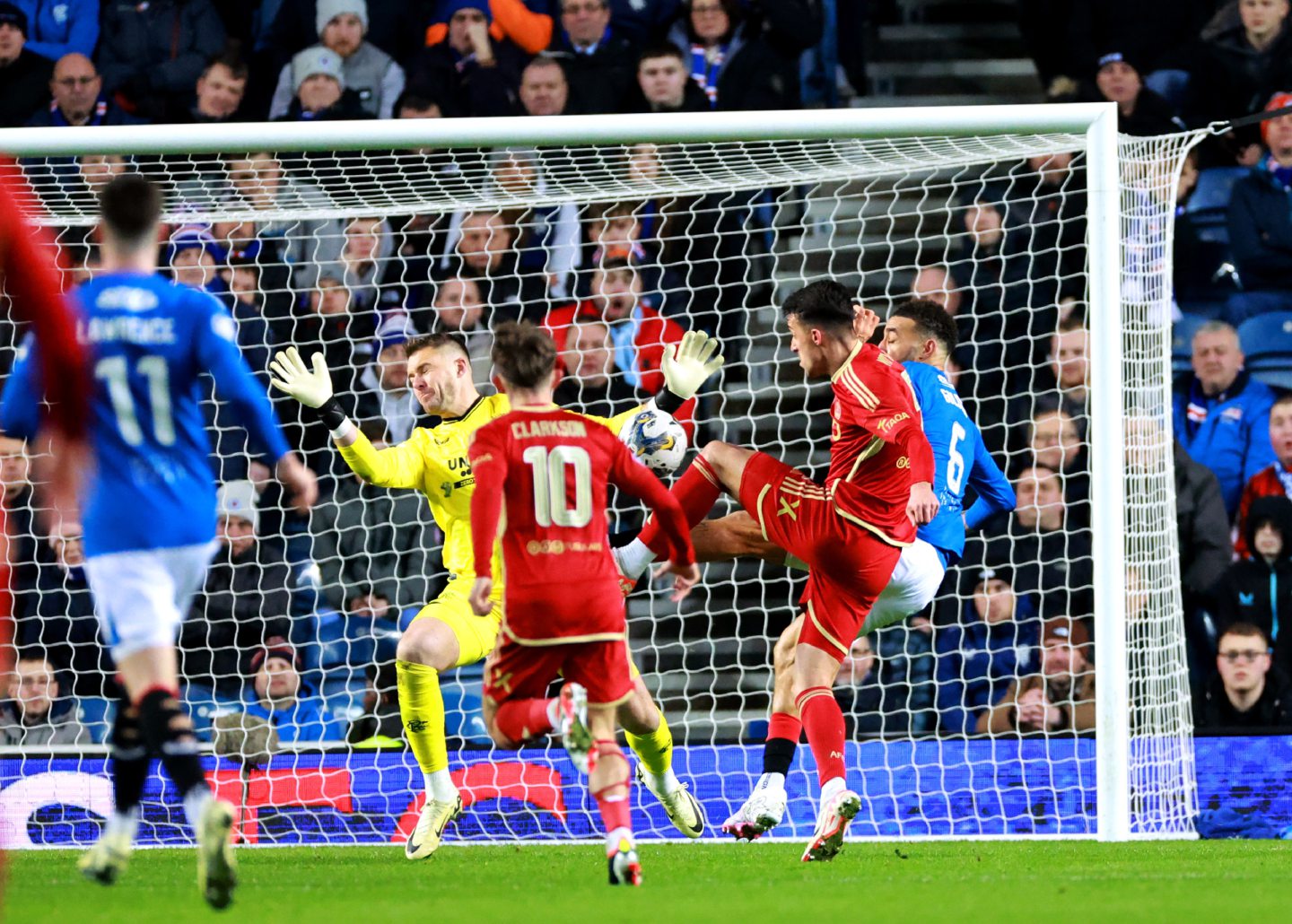 Aberdeen's Bojan Miovski scores in the 2-1 loss to Rangers at Ibrox. Image: PA
