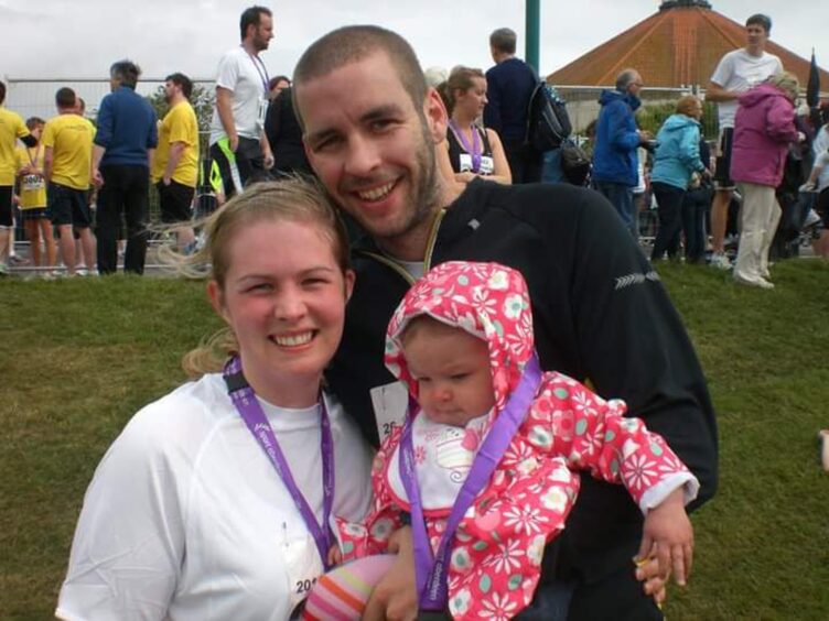 Tamsin pictured with her husband Craig and her daughter Abbie back when her triathlon journey was about to begin.