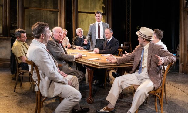 Cast of Twelve Angry Men coming to His Majesty's Theatre in Aberdeen with Tristan Gemmill standing up who plays Juror number three.