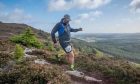 James Cruickshank from Aberdeen running down a mountain in Scotland