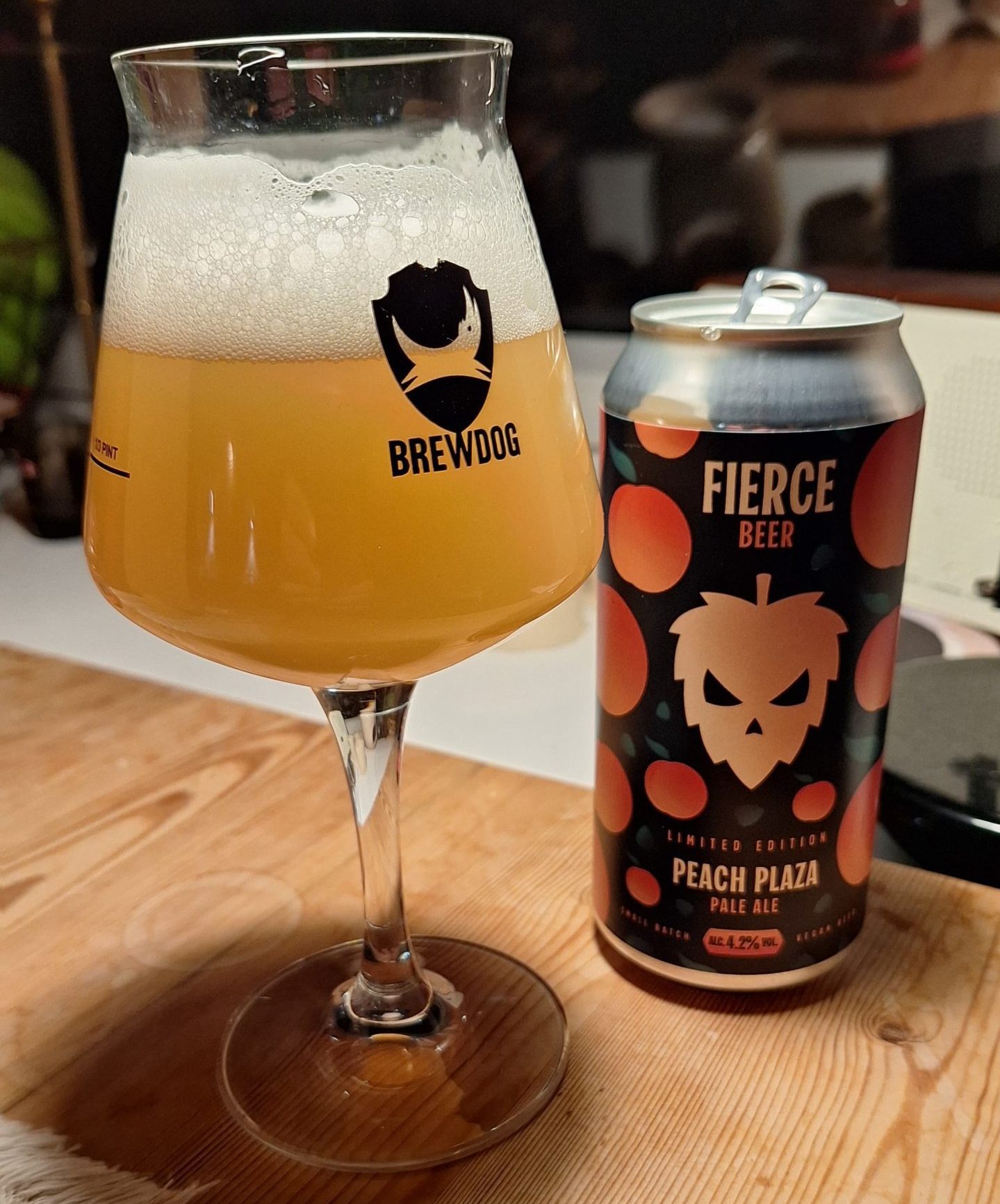 Fierce Beer's Peach Plaza poured out into a glass.
