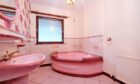Vibrant bathrooms and acres of lands are two of the things that come with this Inverurie property. Image: ASPC