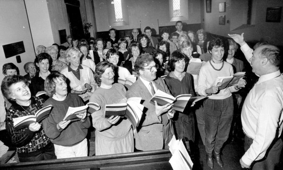 Doctor Roger Williams (right) conducts the Banchory Singers in St Ternan's Church for the Messiah For All performance at the Aberdeen Exhibition and Conference Centre