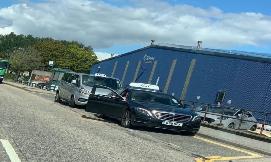 Aberdeen taxi driver Billy McKenzie stopped in a layby near the airport to adjust his fake leg - and was given a formal warning for his trouble. Image: Aberdeen City Council