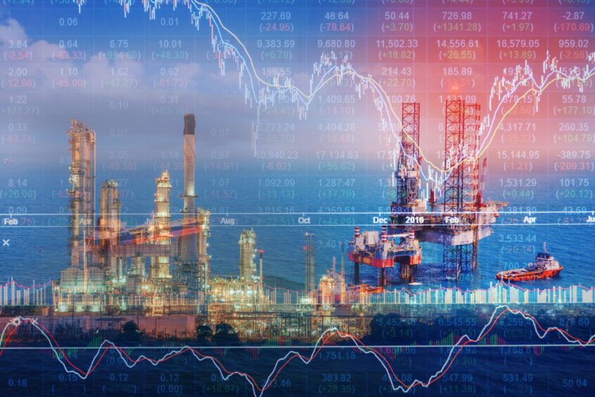 Stock market concept with oil rig in the gulf and oil refinery industry background.