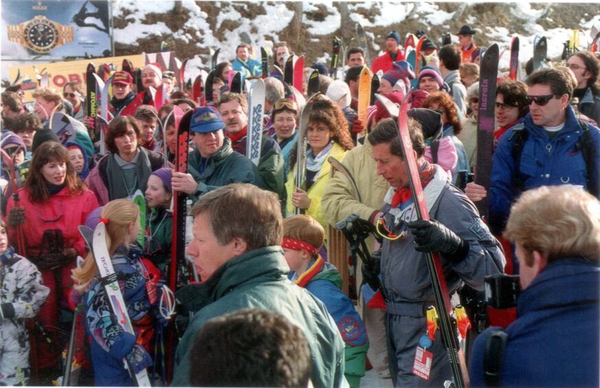Prince Charles queuing for the ski lift at Klosters a few days before his apartment at St James's Palace was burgled.