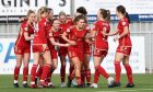 Aberdeen Women celebrate with Eva Thomson after she scored against Glasgow City.