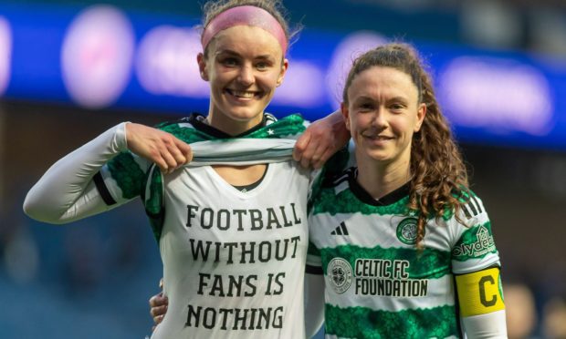 Celtic defender Caitlin Hayes wears a t-shirt which says 'football without fans is nothing' after away fans were banned from attending the Old Firm clash with Rangers in the SWPL at Ibrox.