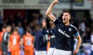 Cammy Kerr celebrates a Dundee victory over Dundee United in 2017. Image: SNS