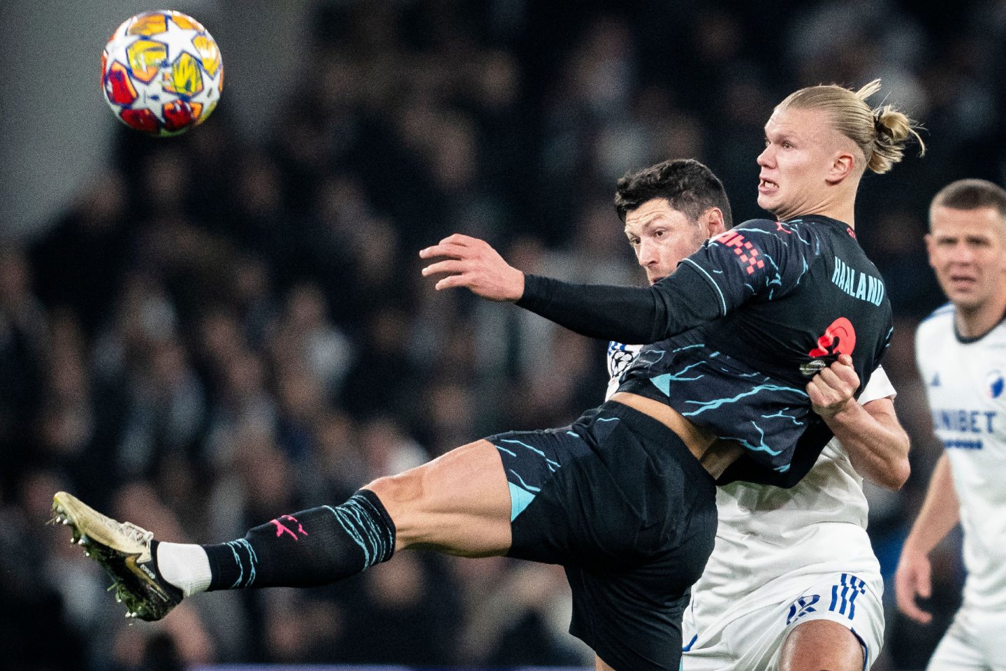 FC Copenhagen's Scott McKenna in action against Manchester City's Erling Haaland during a Champions League last 16 clash in Denmark. Image: Shutterstock 
