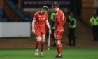 Stefan Gartenmann and Nicky Devlin of Aberdeen FC look dejected at the end of the 1-0 loss to Dundee. Image: Shutterstock