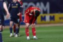 Jamie McGrath (7) of Aberdeen looks dejected at the end of the Cinch Scottish Premiership match between Dundee and Aberdeen at Dens Park. Image: Shutterstock.