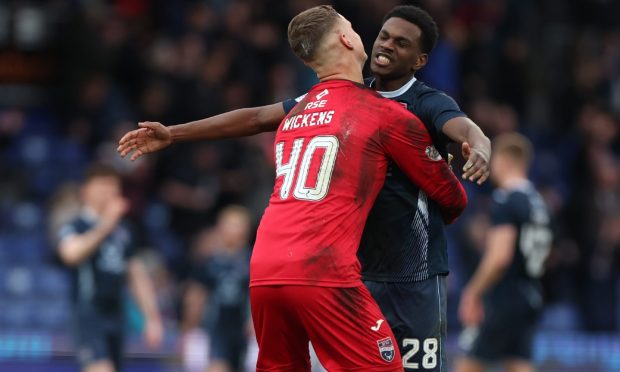 George Wickens and Loick Ayina celebrate following Ross County's win over Hearts. Image: Shutterstock.