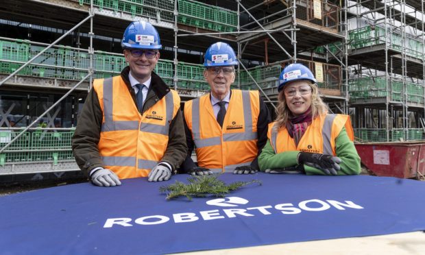 l-r Scotland Office Minister John Lamont, Sir Ian Wood and Gillian Martin MSP at the topping-out ceremony at One SeedPod in Aberdeen.
