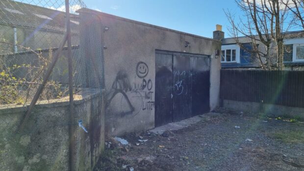 The derelict garage on Don Street was raided earlier this week