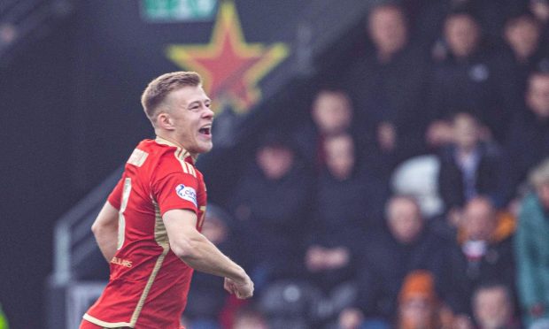 Aberdeen's Connor Barron celebrates as he scores to make it 1-0 against St Mirren. Image: SNS